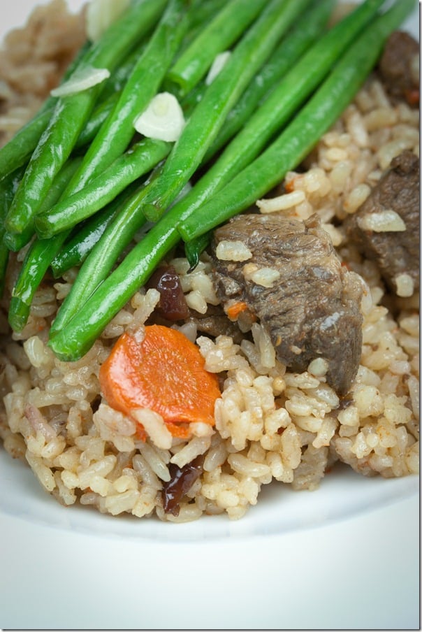 Beef Plov with Green Beans is comfort food at it's finest. Fluffy rice is cooked with chunks of tender beef infusing each grain with the most amazing flavor. 