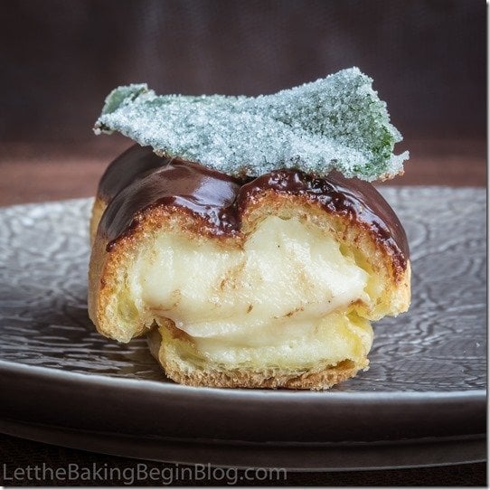 Classic Eclair filled with Custard and topped w/ Chocolate Glaze. by Let the Baking Begin!