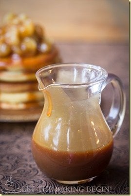 Homemade caramel sauce in a glass container.