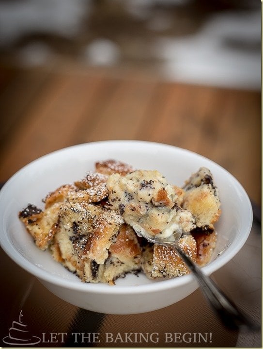 Baked French Toast with tons of poppyseeds, white and dark chocolate and condensed milk. This Breakfast Bake will have everyone begging for the recipe!