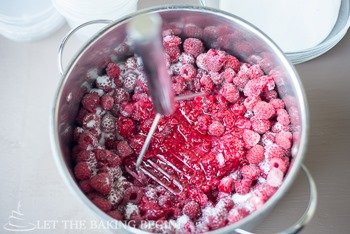  How to make homemade raspberry jam in a pot with fresh raspberries and sugar. 