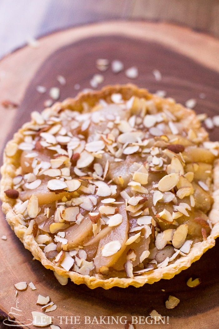 Pear frangipane tart with pears and sliced almonds