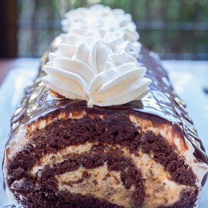 Chocolate Roll with Walnuts & Dulce de Leche Buttercream – You’re going to love how rich and chocolaty this roll is! by LettheBakingBeginBlog.com | @Letthebakingbgn