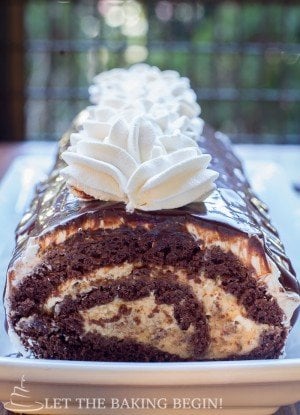 Chocolate Roll with Walnuts & Dulce de Leche Buttercream – You’re going to love how rich and chocolaty this roll is! by LettheBakingBeginBlog.com | @Letthebakingbgn