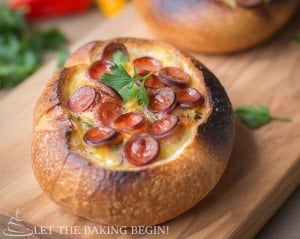 Egg and Sausage Stuffed Breakfast Boats - an easy-peasy breafast that is filled with all things delicious – cheese, sausage and egg. By LetTheBakingBeginBlog.com | @Letthebakingbgn