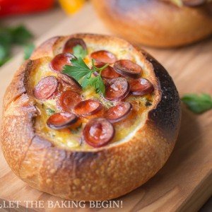 Egg and Sausage Stuffed Breakfast Boats - an easy-peasy breafast that is filled with all things delicious – cheese, sausage and egg. By LetTheBakingBeginBlog.com | @Letthebakingbgn