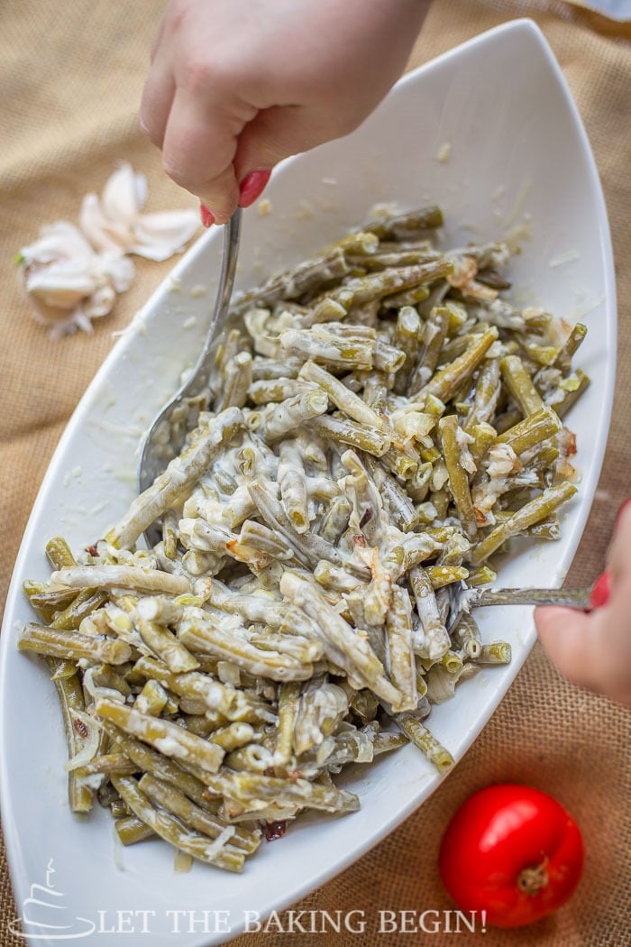 Creamy Garlic Parmesan Beans, simmered in the white garlic sauce until the flavor has permeated all the way through.