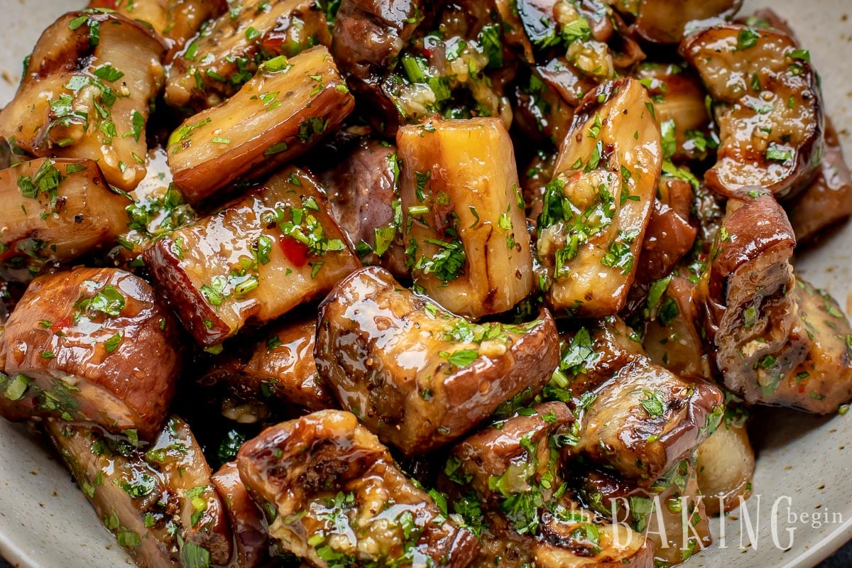 Grilled Eggplant in Sweet Chili Garlic Sauce - this simple Chinese eggplant recipe can be made with either stir-fried, grilled or roasted eggplants. Just cook the eggplant, then combine with garlic, sweet spicy chili sauce and herbs and you've got the best eggplant recipe out there.