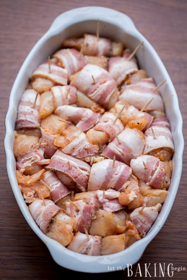 Chicken breast wrapped in smoked bacon and baked until creamy and tender. Topped with cheese.