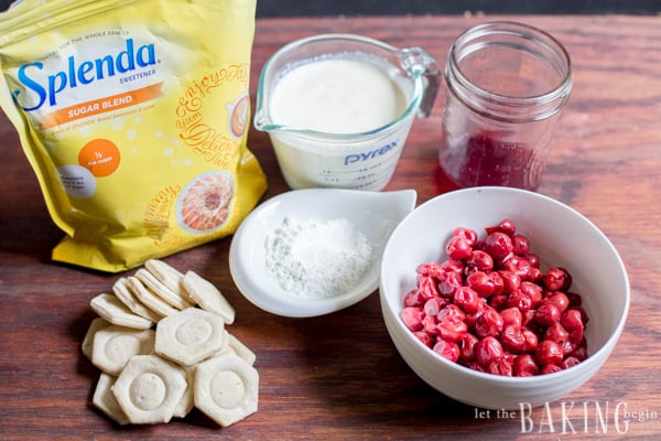 Splenda, canned sour cherries, sugar, puff pastry and heavy whipping cream on a platter. 