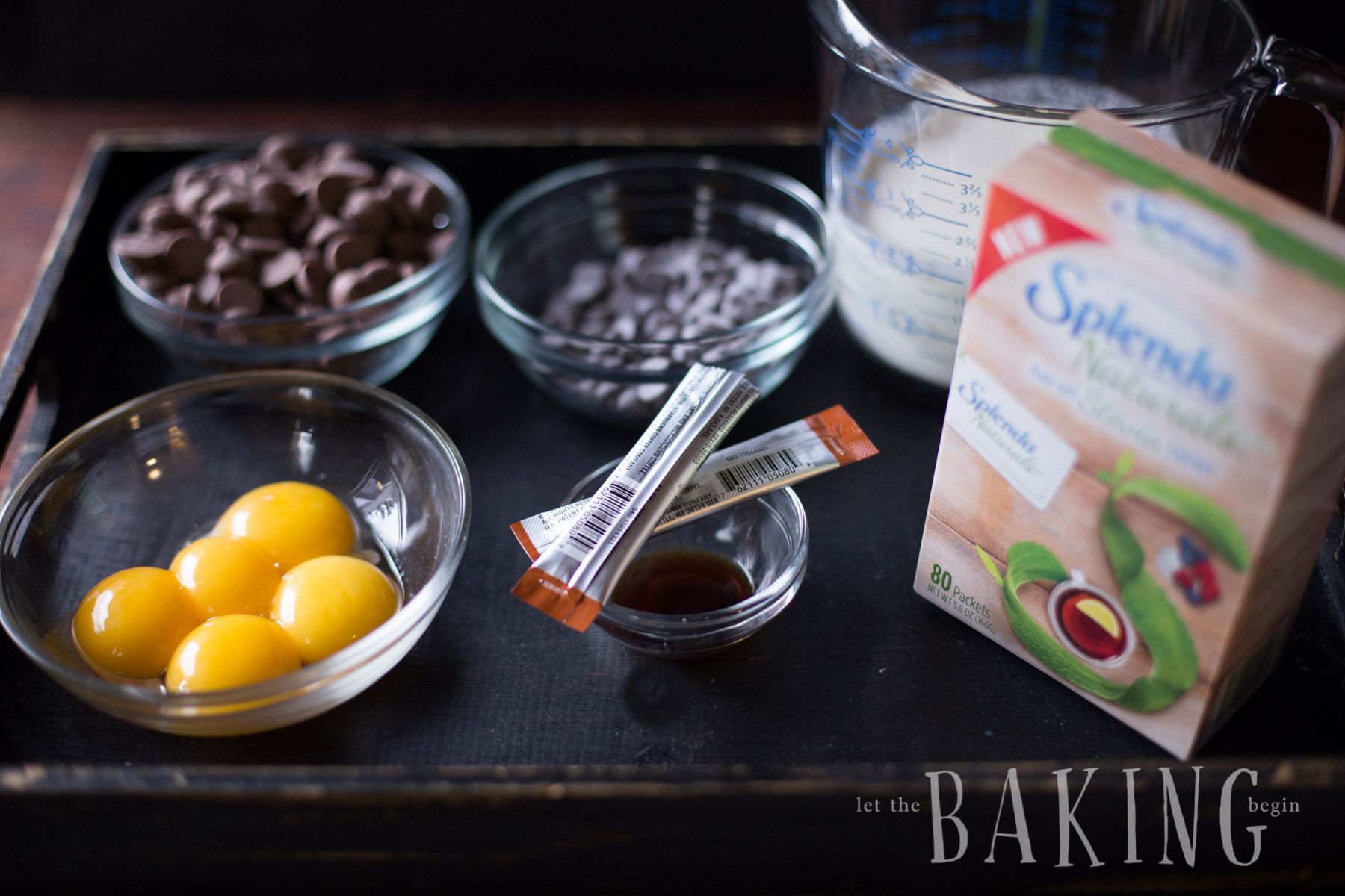 Ingredients for pot de creme including chocolate, egg yolks, creme, splenda