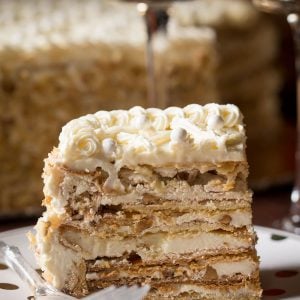 Markiza Cake Recipe (Marquise Cake) - Shortbread cake layers topped with crunchy meringue and walnuts, then sandwiched with Russian Buttercream | by Let the Baking Begin!