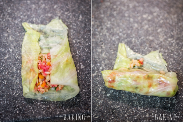 Cabbage leaf is filled with meat and rice mix and rolled. 