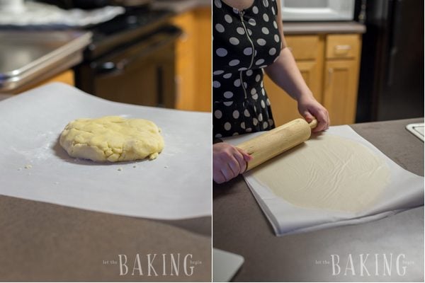 How to roll out dough for plum butter cookies on parchment paper with a rolling pin.