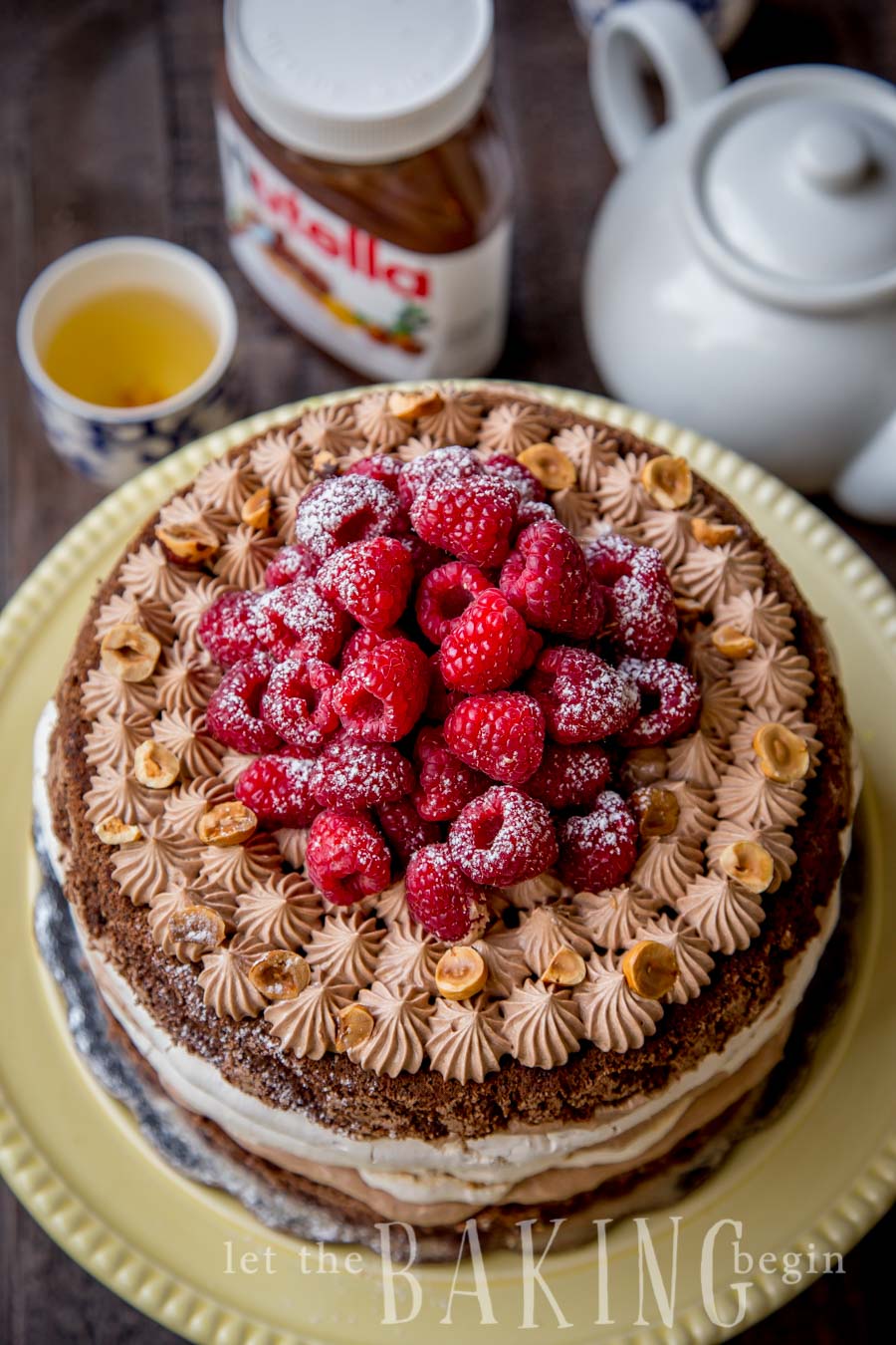 Hazelnut Meringue Nutella Cake - Layers Chocolate Poppyseed Cake, Hazelnut Meringue and Nutella Custard Buttercream will have your guests swoon from this deliciousness! Step by Step pictures are included for guaranteed success! | by Let the Baking Begin!