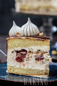 Kiev Cake - Yellow Sponge Cake combined with Hazelnut Meringue, Russian Buttercream and Tart Cherries. A very loose but incredibly delicious interpretation of a classic Ukrainian Cake | By Let the Baking Begin!