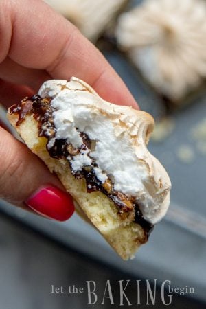 Plum butter pirog with roasted walnuts and meringue topping