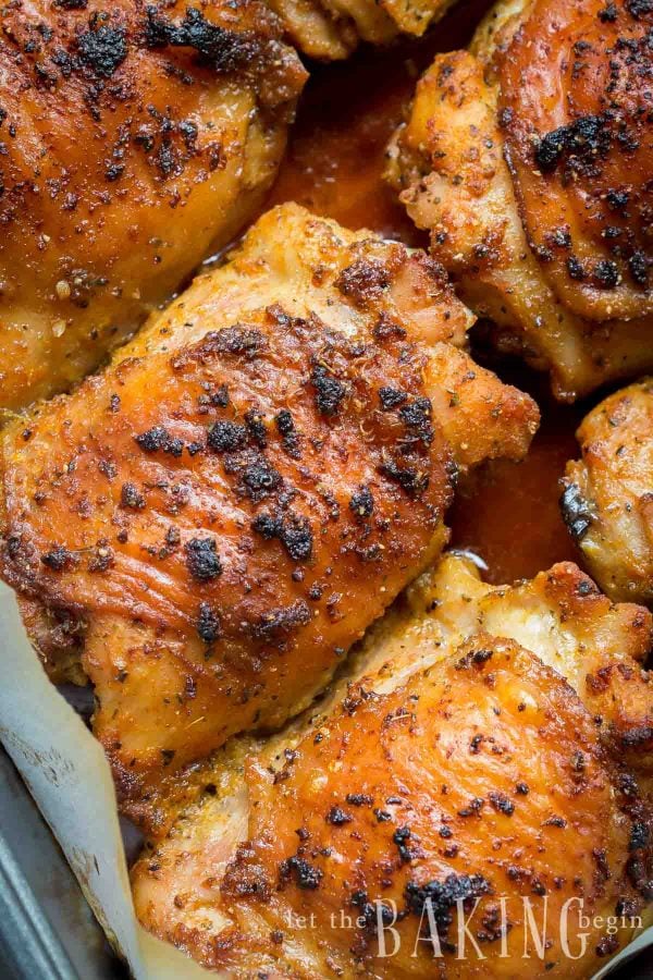 Garlic Ranch Baked Chicken Thighs are crispy on the outside and very tender on the inside. Just toss the chicken thighs with ranch seasoning and garlic, then bake! This recipe is our go to recipe for busy weeknight dinners.
