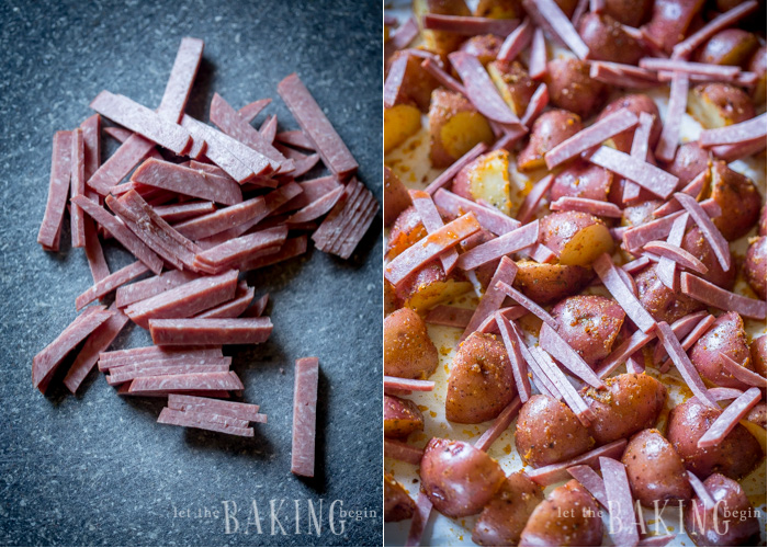 Strips of cut sausage being roasted with breakfast potatoes