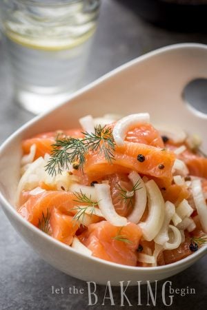 Cured Salmon is a cross between a lox and gralvax. It is brined in a salty-sweet brine with spices and eaten in chunks with a hot baked potato.