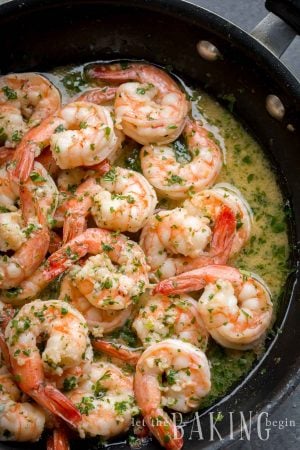 Shrimp Scampi is made of shrimp or prawns that are cooked in butter and wine sauce with lots of garlic and fresh parsley. The sauce that surrounds the shrimp is absolutely amazing. You will want to soak up every little tiny bit of it with some good crusty bread!