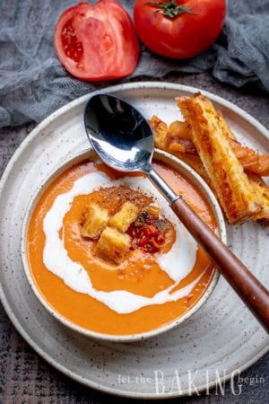 Roasted Tomato soup is made with simple ingredients, that combined give one of the best tomato soups you will ever have. The grilled peppers and roasted garlic are what takes this soup to the next level.