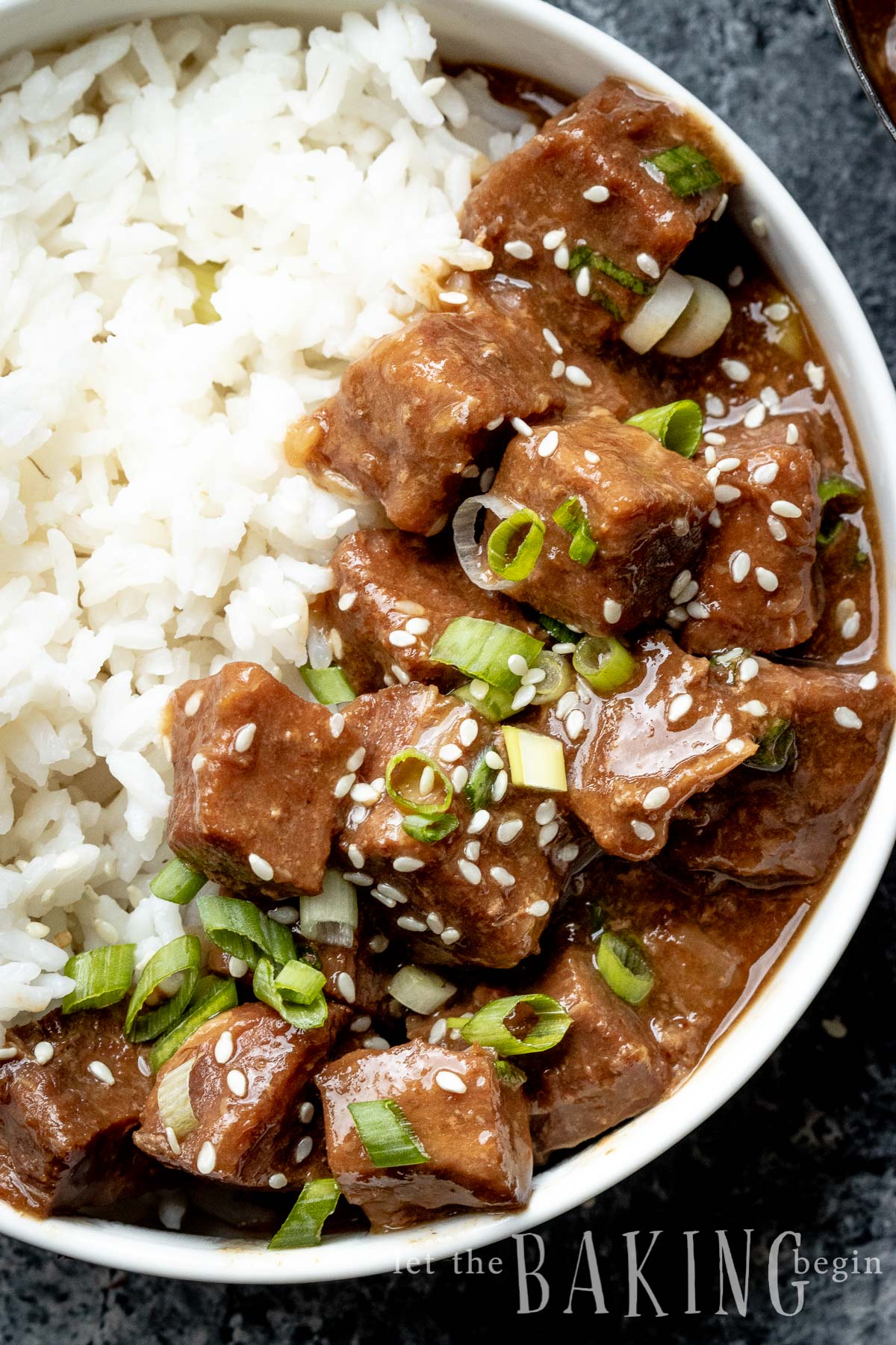 Instant Pot Korean Beef and Rice is perfect for a busy weeknight dinner. The notes of ginger and garlic give this tender beef recipe that Asian flavor flare that my family absolutely loves! Forget takeout and make this at home instead!