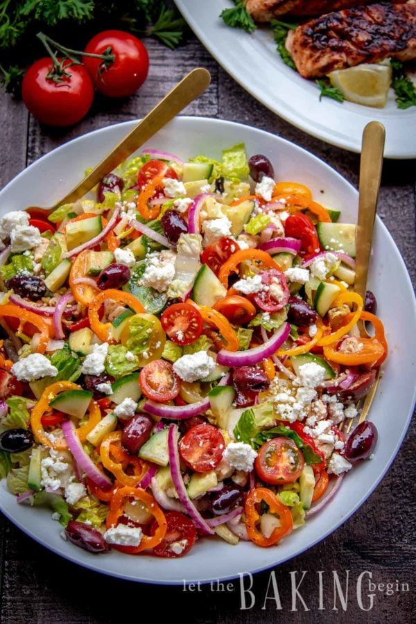 Easy to make Greek salad recipe sprinkled with feta and tossed in dressing