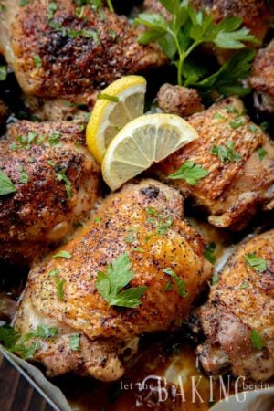 Baked Lemon Chicken with lemon slices and parsley over the top.
