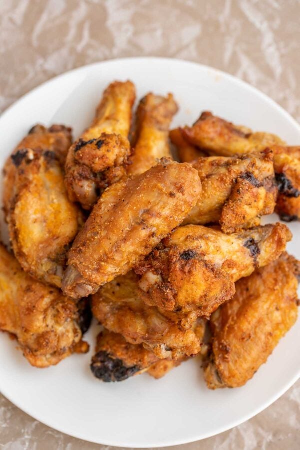 A plate of crispy baked chicken wings