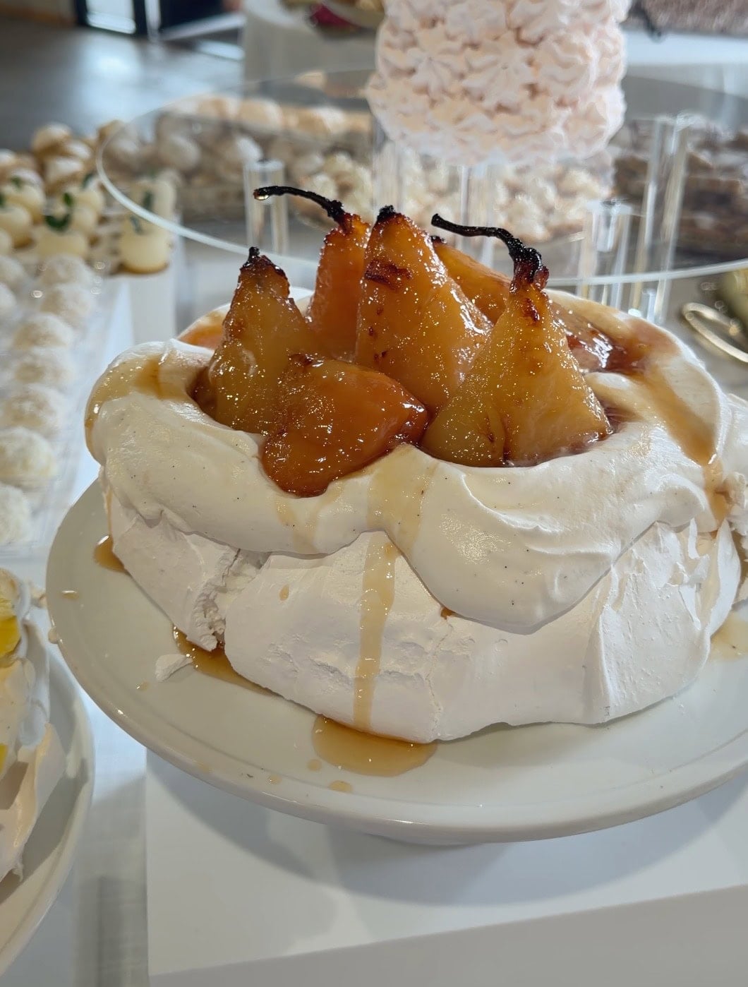 Close up of the pavlova meringue shell under whole roasted pears