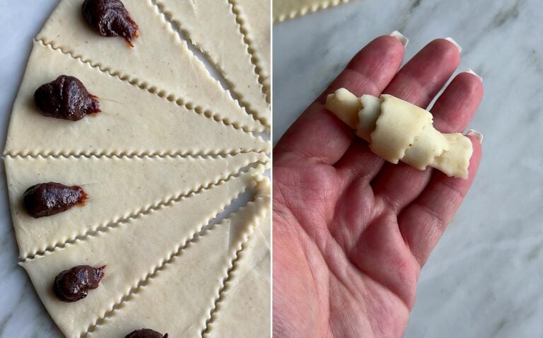 Plum butter piped at the wide end of each wedge, then a rolled rogaliki crescent in hand